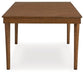 Lyncott Dining Extension Table - J. Patrick’s Furniture (Pooler, GA)
